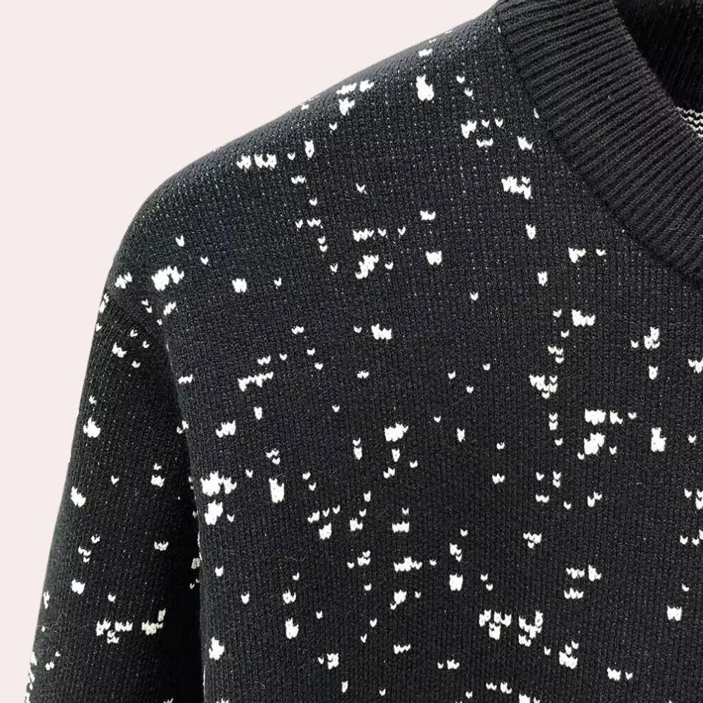 Schwarzer Strickpullover mit weißem Muster, Rundhalsausschnitt, Baumwolle, modisch, warm.
