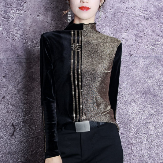 Schwarzes und goldenes Damenoberteil, langärmelig, glänzend, elegantes Design, modisch.