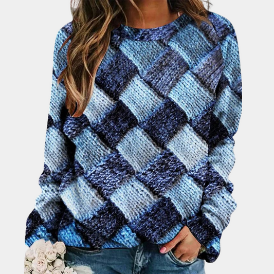 Frau in blauem Strickpullover mit Karomuster, lässige Mode, Damenbekleidung.