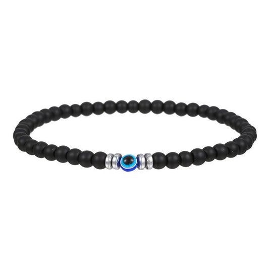 Schwarzes Perlenarmband mit blauem Auge, silberne Akzente, Unisex-Schmuck, modisch.