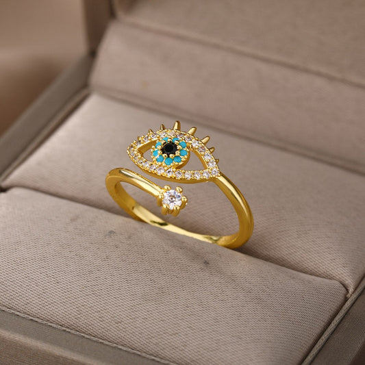 Goldener Ring mit blauem Auge und Zirkonia, Schmuck, Geschenk, modisch, Damenaccessoire.