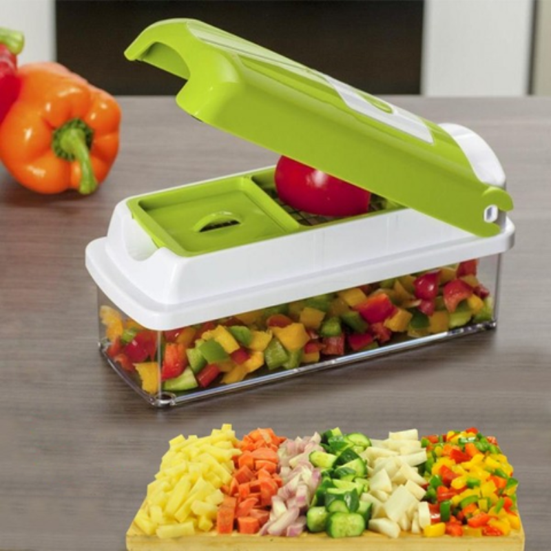 Grüner Nicer Dicer Plus Gemüseschneider mit Behälter, ideal für schnelle Küchenvorbereitung.