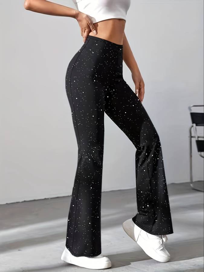 Schwarze Damen-Schlaghose mit weißen Punkten, modisch, bequem, ideal für Freizeit und Sport.