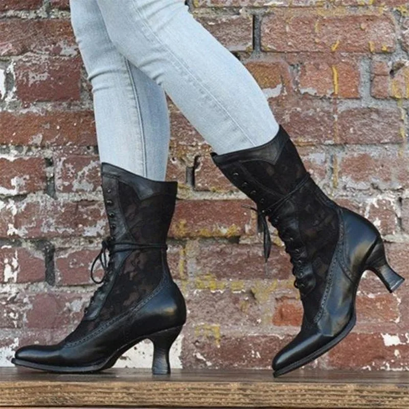 Damen Vintage Stiefeletten, schwarz, spitze Zehen, Schnürung, hoher Absatz, elegantes Design.