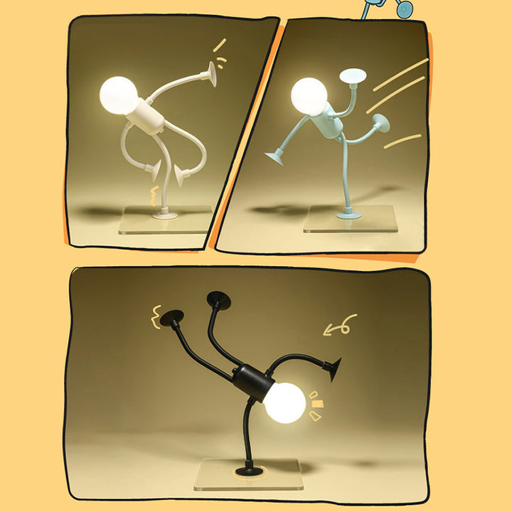 Tři komiksová okénka s bílou, modrou a černou lampičkou v tanečních pózách na průhledné podložce. 1