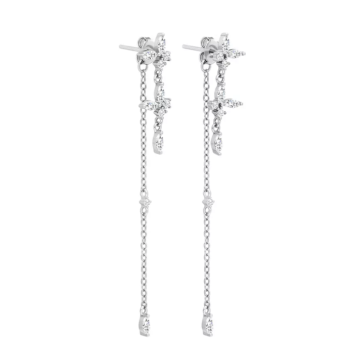 Silberne Ohrringe mit langen Ketten und funkelnden Kristallen, eleganter Schmuck für Damen.