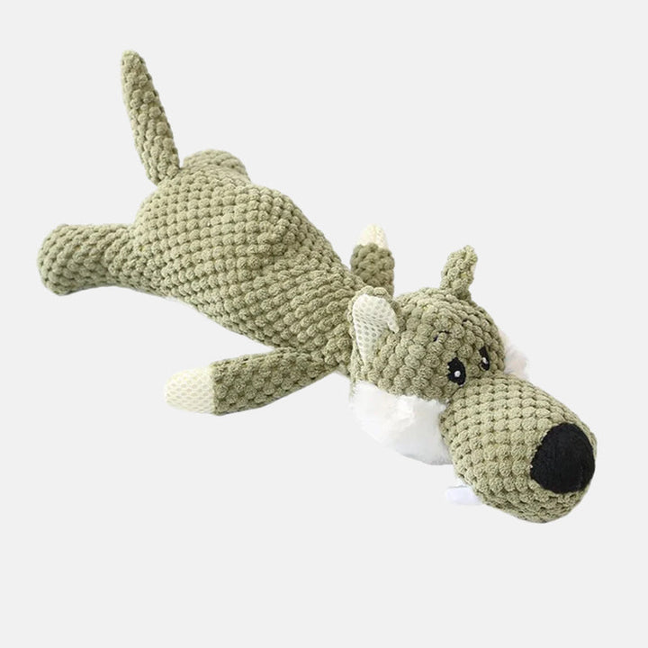 Grünes Plüsch-Wolfspielzeug, weich, für Kinder, aus Stoff, liegend, mit weißen Details.