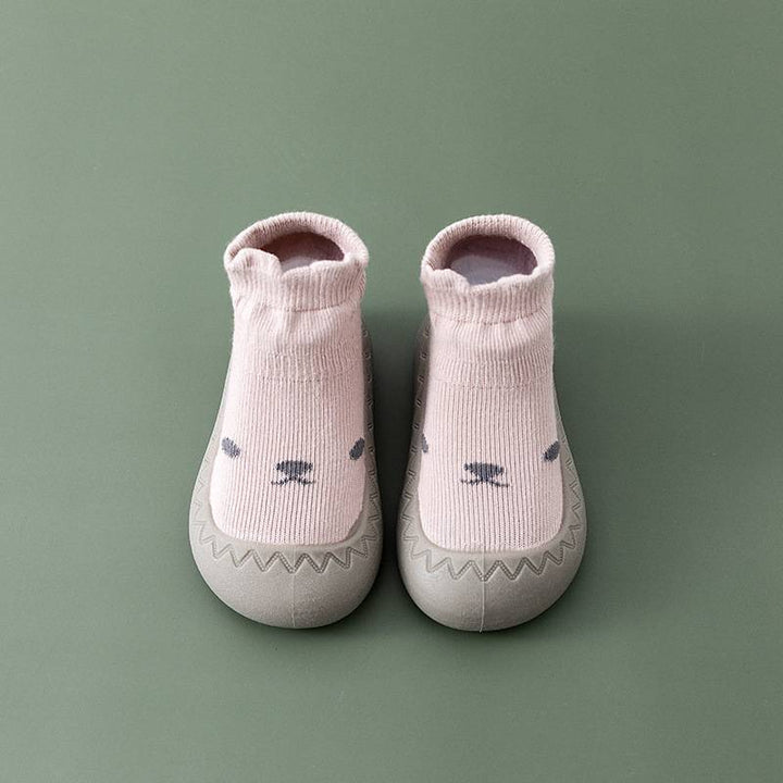 Rosa Babyschuhe mit Tiergesicht, rutschfest, weiche Sohle, ideal für Kleinkinder.