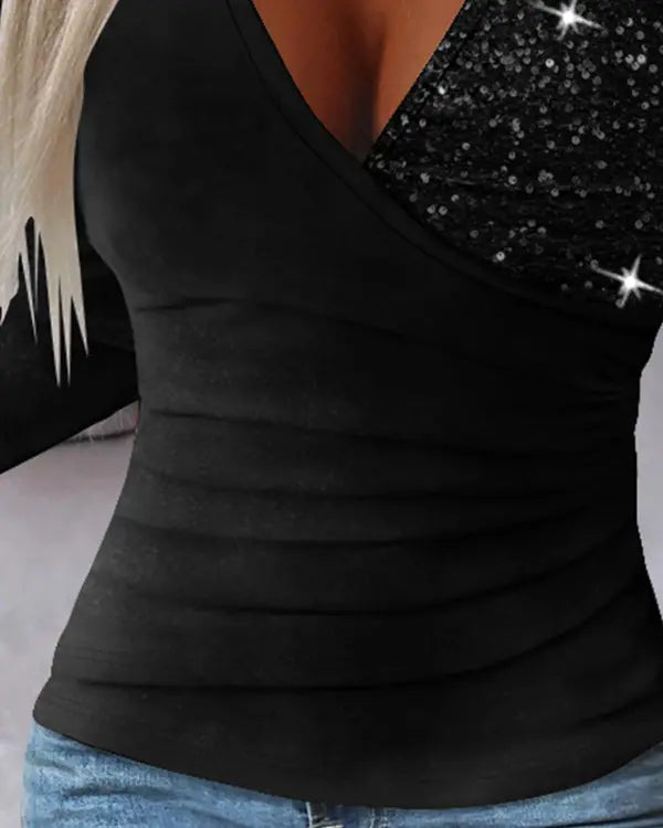 Schwarzes Damenoberteil mit Pailletten, asymmetrischer Ausschnitt, elegantes Design, Partylook.