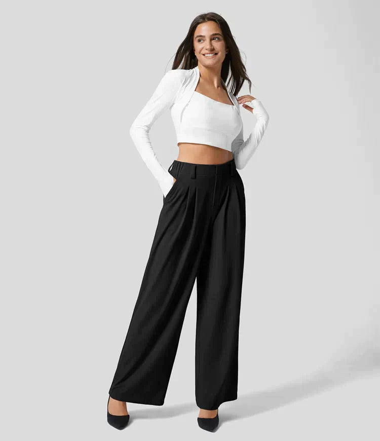 Frau in weißem Top und schwarzer Hose, Mode, elegante Damenbekleidung, lässiger Stil.
