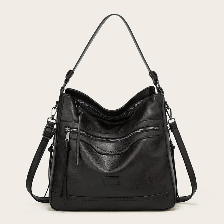 Schwarze Lederhandtasche mit Reißverschlusstaschen, verstellbarem Schulterriemen, elegant.
