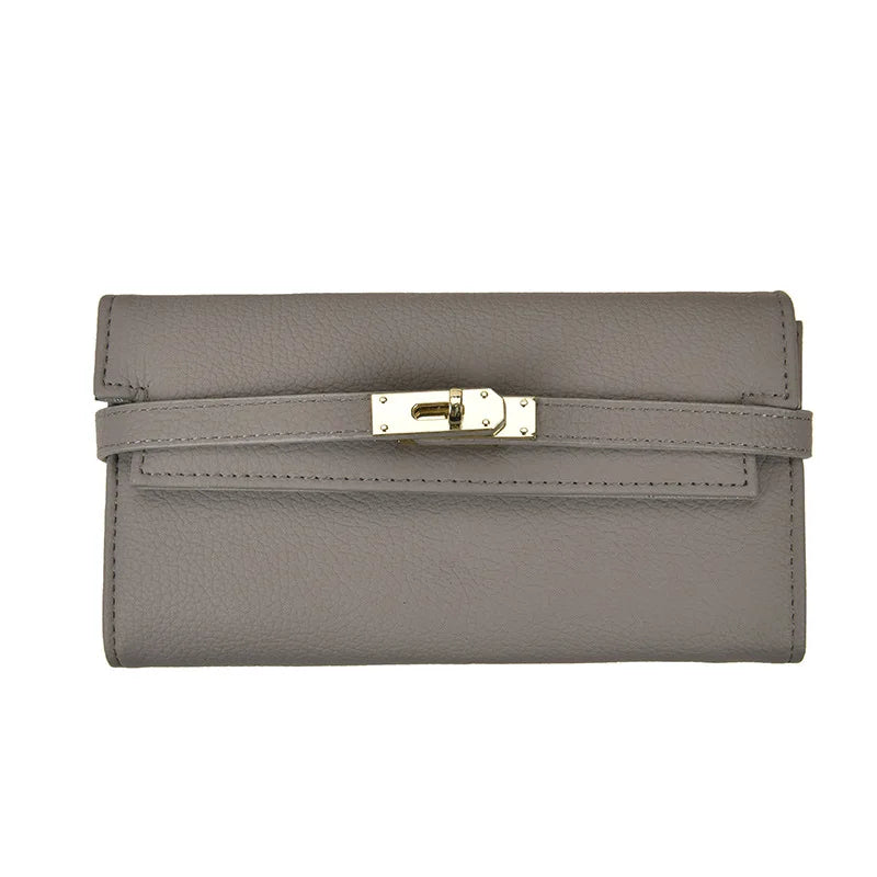 Graue Lederhandtasche mit Schnalle, elegante Damenmode, stilvolles Accessoire.