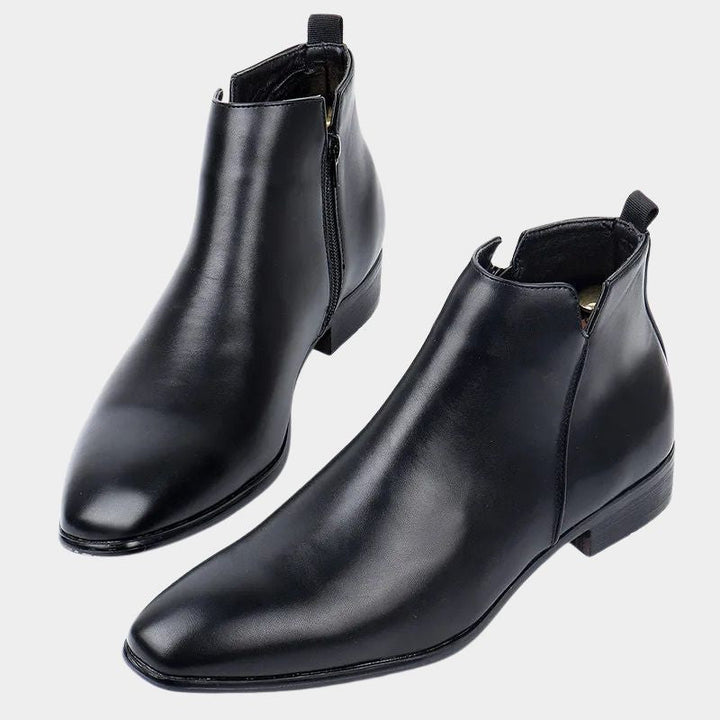 Schwarze Chelsea Boots aus Leder, elegant, für Herren, modisch, rutschfeste Sohle.
