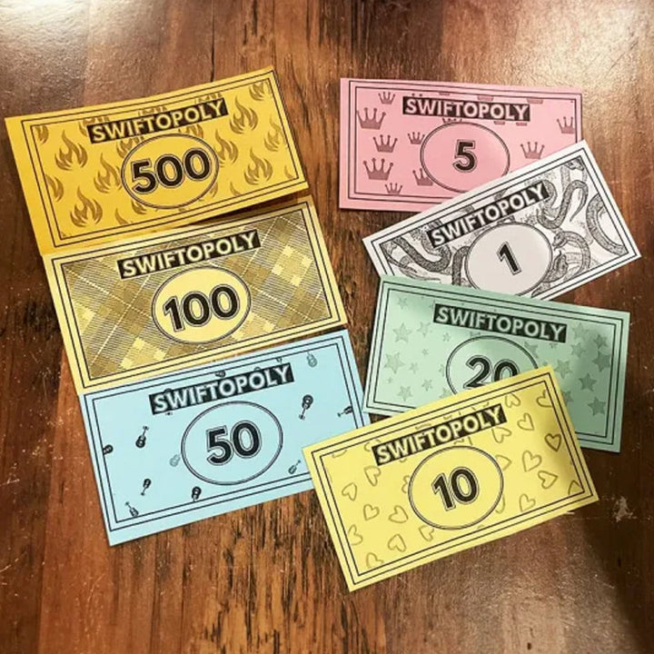 Hudba založená na deskové hře s písňovými kartami a Monopoly penězi pro herní večery.