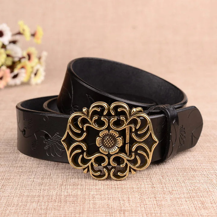 Schwarzer Ledergürtel mit goldener Blumenmetallschnalle, modisch, elegant, Damenaccessoire.