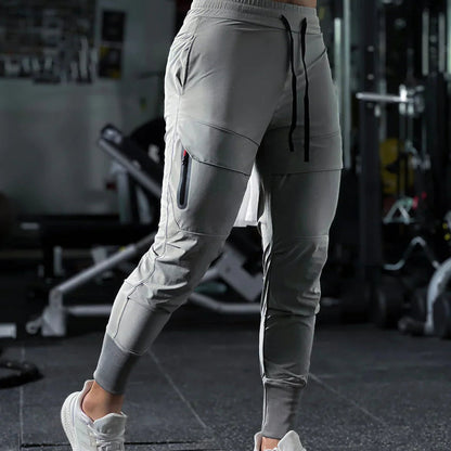 Pánské sportovní kalhoty s elastickým pasem a kapsami – Dario