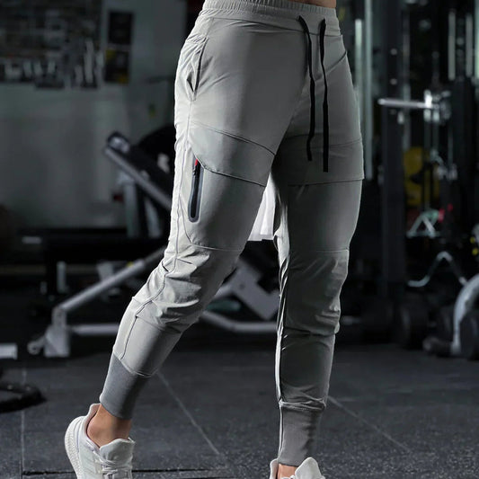 Pánské sportovní kalhoty s elastickým pasem a kapsami – Dario