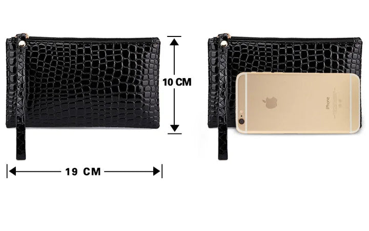 Schwarze Leder-Clutch mit Krokodilprägung, 19x10 cm, neben iPhone für Größenvergleich.