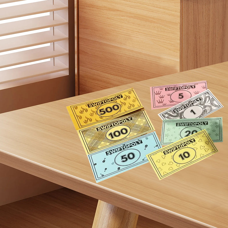 Hudba založená na deskové hře s písňovými kartami a Monopoly penězi pro herní večery.