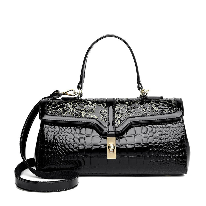 Schwarze Lederhandtasche mit Blumenmuster, Krokodilprägung, goldener Verschluss, Damenmode.