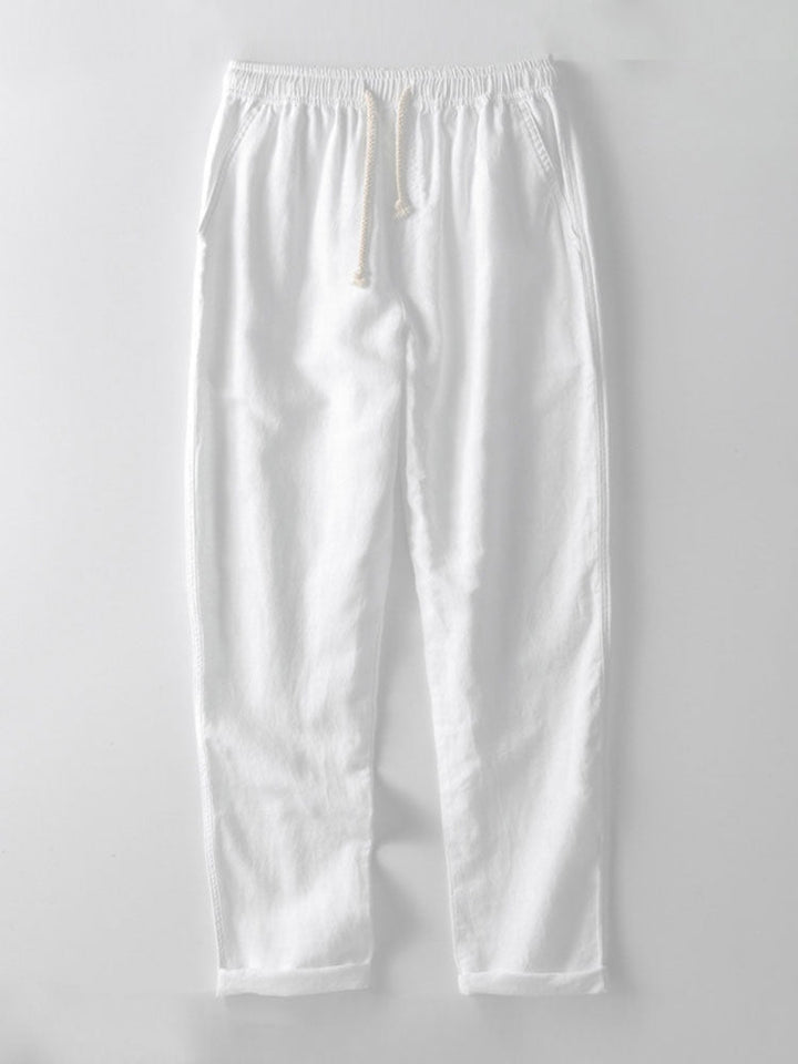 Weiße Leinenhose mit Kordelzug, lässig, atmungsaktiv, ideal für Sommermode.