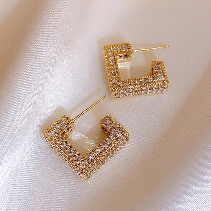 Goldene quadratische Ohrringe mit Zirkonia, geometrisches Design, antiallergisch für Damen.