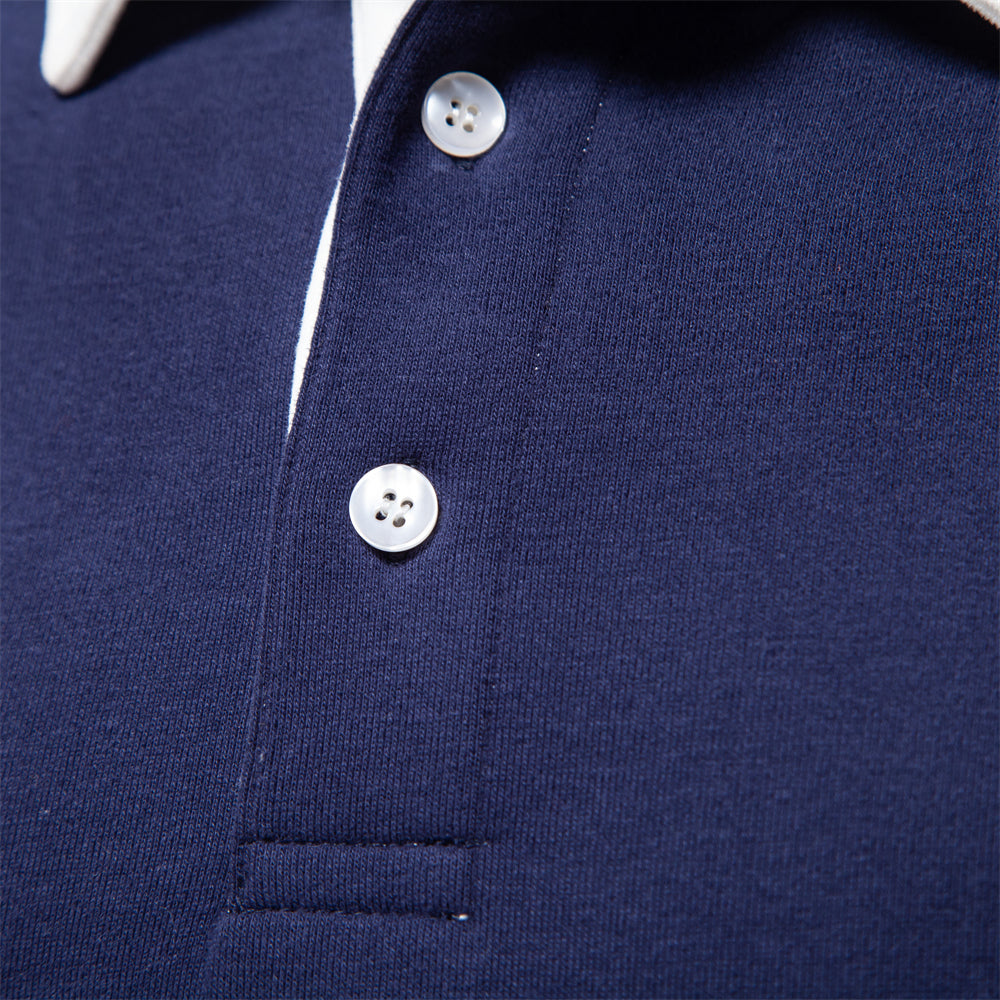 Dunkelblaues Polohemd für Herren, Baumwolle, Herbstmode, weiße Knöpfe, elegantes Design.
