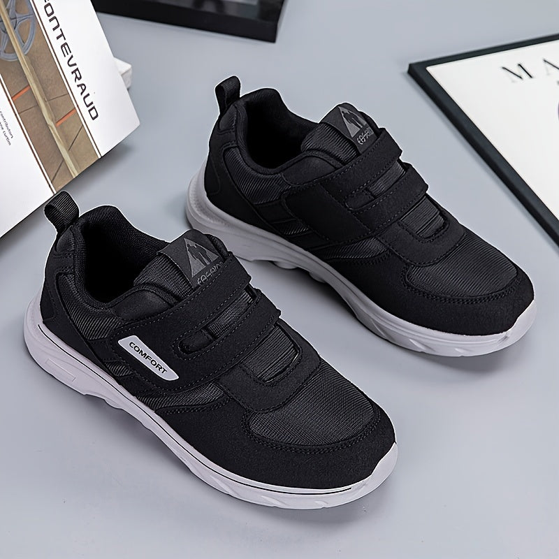 Schwarze Kinderschuhe mit Klettverschluss, rutschfeste Sohle, bequem, sportlich.