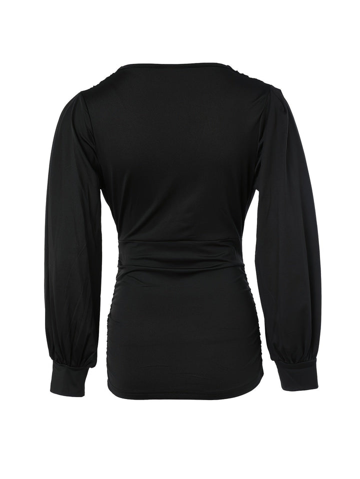 Schwarzes Damen-Langarmshirt, elegantes Design, weicher Stoff, ideal für Freizeit und Büro.