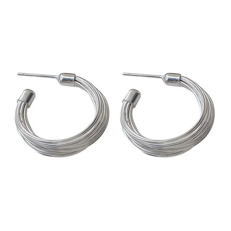 Silberne Creolen Ohrringe, Edelstahl, modisches Design, Damen Schmuck, elegant und zeitlos.