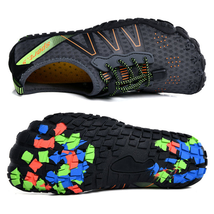 Grauer Barfußschuh mit bunter Sohle, atmungsaktiv, rutschfest, ideal für Outdoor-Aktivitäten.