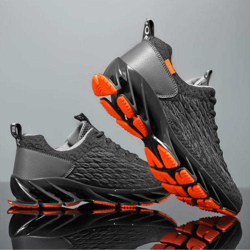 Graue Sportschuhe mit oranger Sohle, atmungsaktives Mesh, rutschfest, Herren Sneaker.