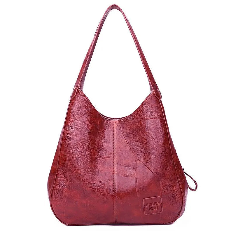 Rote Lederhandtasche für Damen, Hobo-Stil, modisch und geräumig.