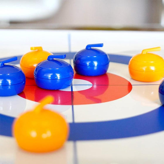 Mini-bordcurling hra pro domácnost s klouzavými kameny a magnetickými tyčemi