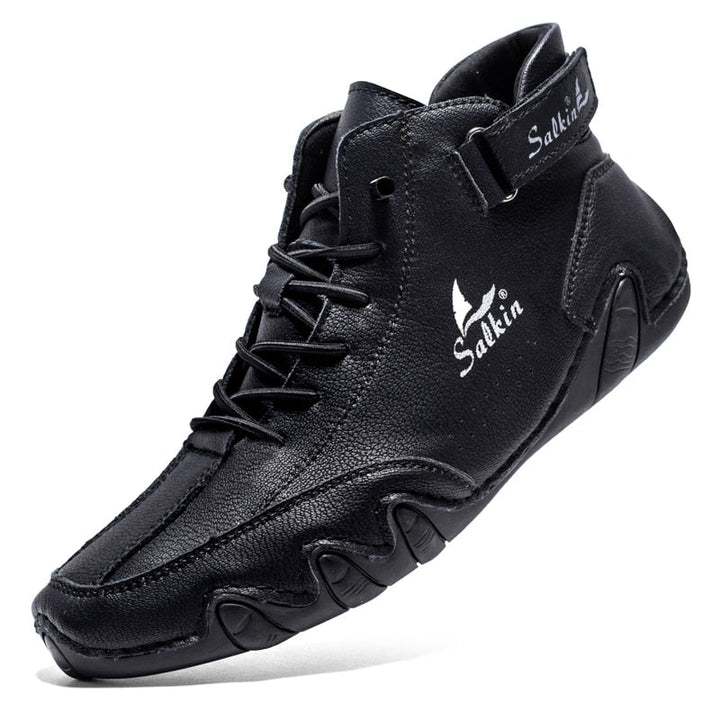 Schwarzer Leder-Sneaker mit Klettverschluss, rutschfeste Sohle, modischer Herren-Freizeitschuh.
