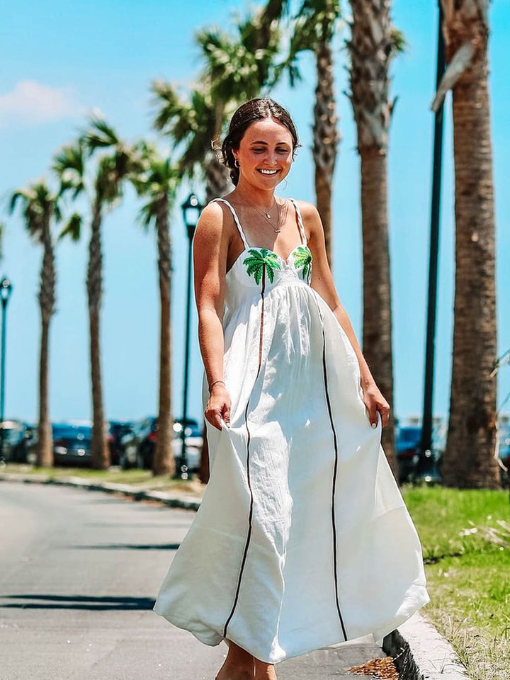 Trendy šaty na ramínka s tropickým palmovým potiskem – Estelle