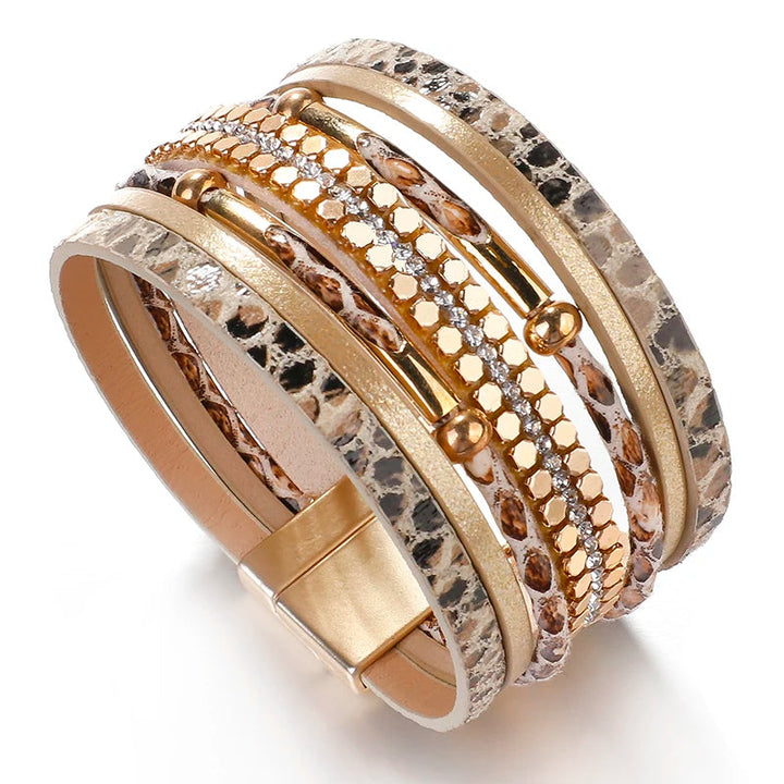 Mehrschichtiges Armband, gold und beige, mit Schlangenmuster und Magnetverschluss.