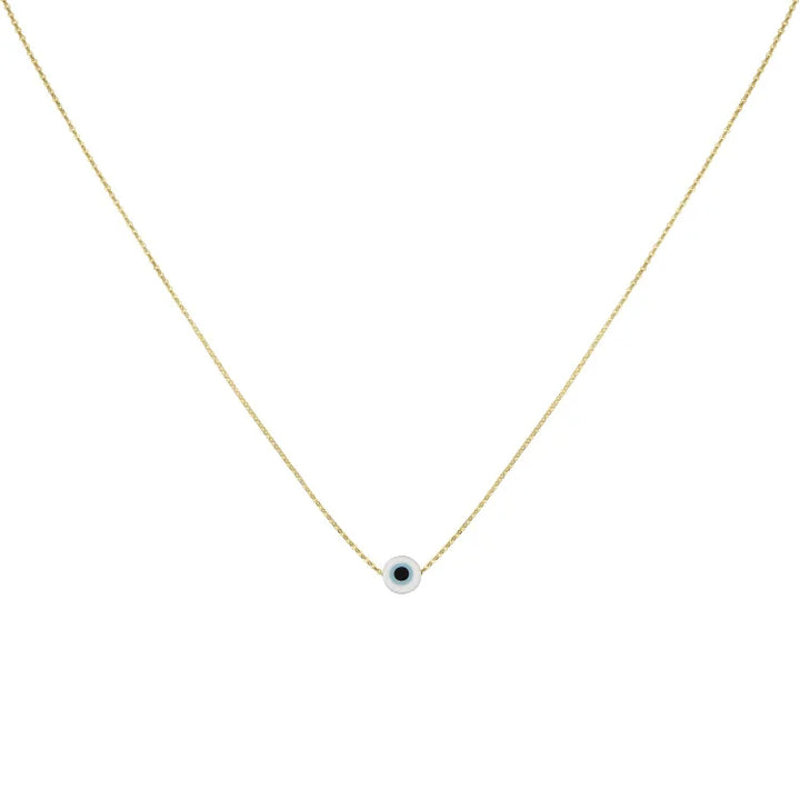 Goldene Halskette mit blauem Auge-Anhänger, minimalistisches Schmuckdesign, modisch.