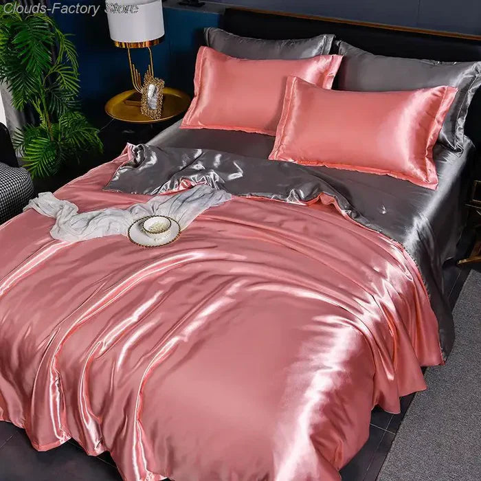Luxuriöse rosa und graue Seidenbettwäsche, glänzend, elegant, Schlafzimmer-Dekoration.