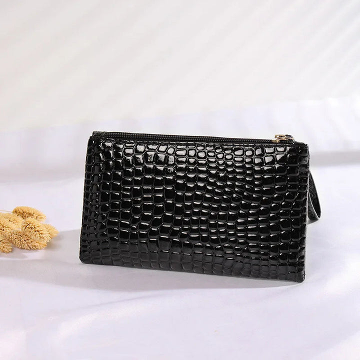Schwarze Krokodilleder-Clutch, elegant, modisch, Damenhandtasche, Accessoire, Abendtasche.