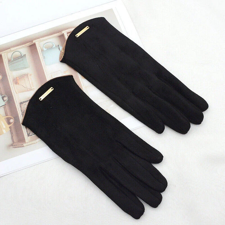 Schwarze Damenhandschuhe aus Leder, elegant, modisch, warm, Winteraccessoire, auf weißem Hintergrund.