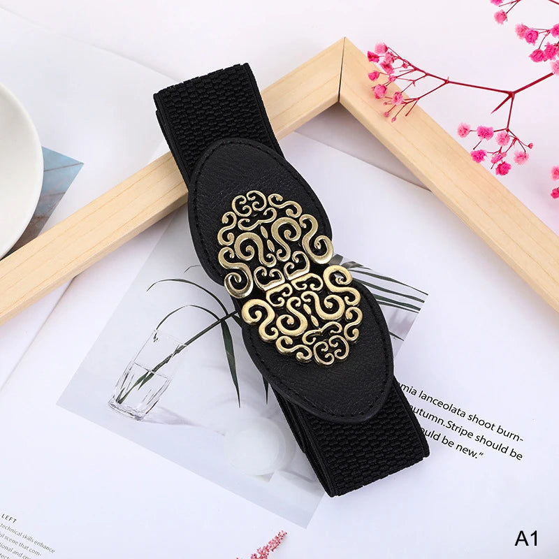 Schwarzer elastischer Gürtel mit goldener Schnalle, Damenmode-Accessoire, elegant und stilvoll.