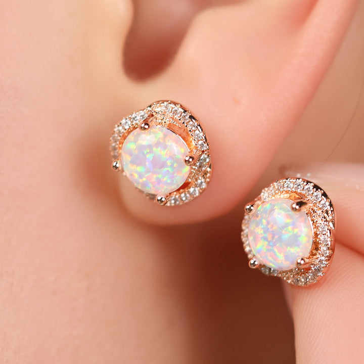 Opal Ohrringe mit Roségoldfassung und Zirkonia, funkelnder Schmuck, elegantes Design.