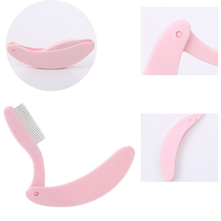 Rosa, klappbarer Wimpernkamm aus Kunststoff für präzises Trennen und Stylen der Wimpern.
