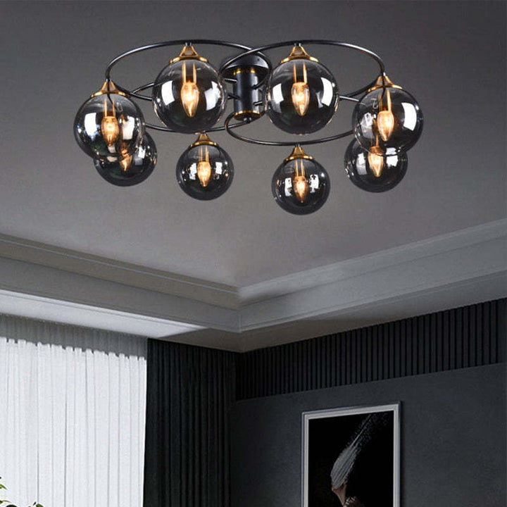 Moderne Deckenleuchte mit schwarzen Glaslampen, ideal für Wohnzimmerbeleuchtung.