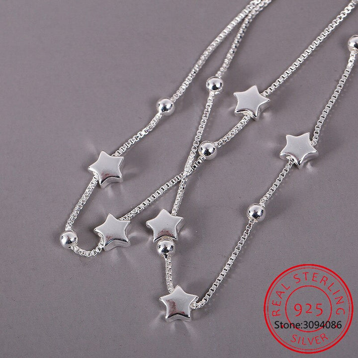 925 Sterling Silber Halskette mit Sternanhängern, elegantes Schmuckdesign für Damen.