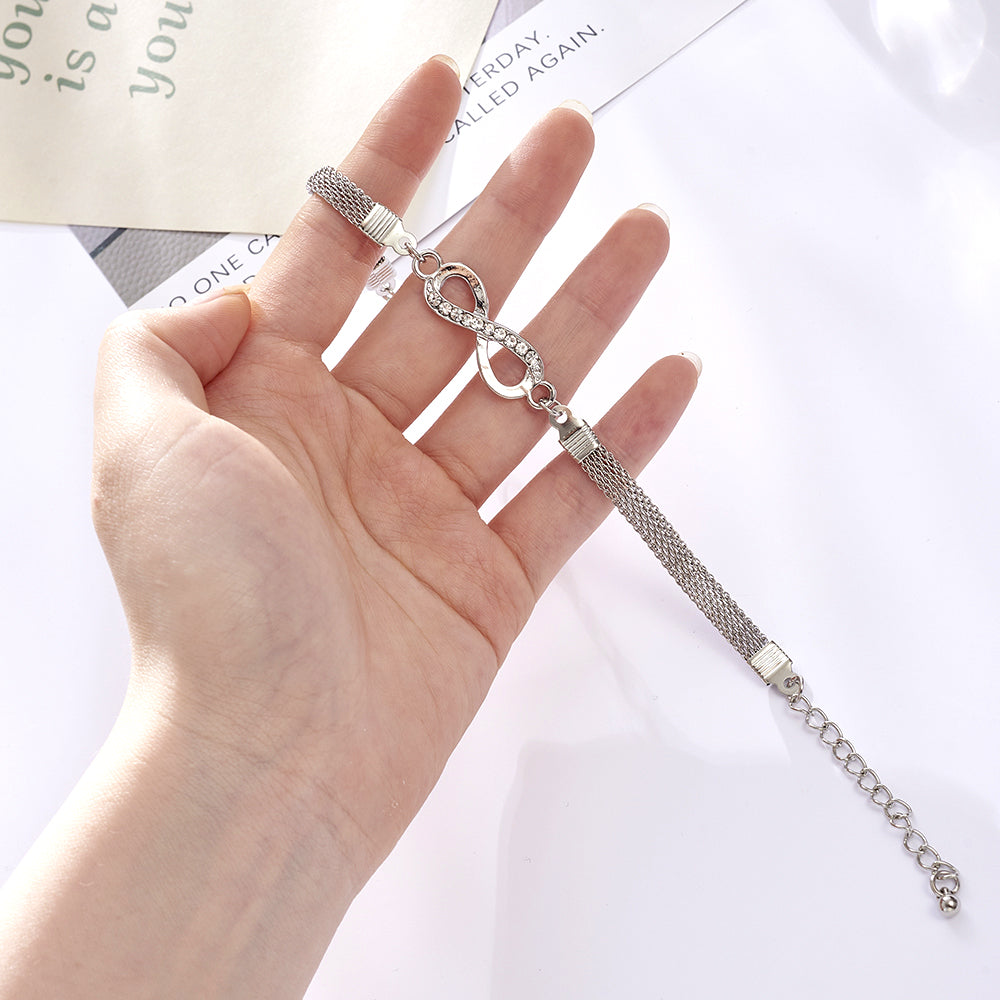 Silberarmband mit Unendlichkeitssymbol, verstellbar, Damen-Schmuck, elegantes Design.