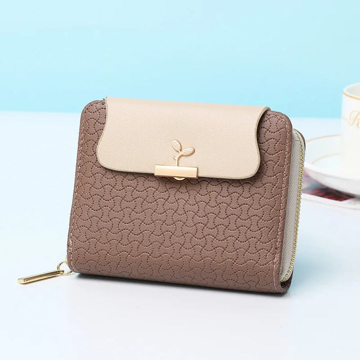 Braune Damen-Geldbörse aus Leder mit Reißverschluss, elegantes Design, kompakt, modisch.