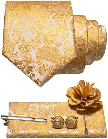 Set se zlatožlutou paisley kravatou na světlém podkladu, kapesníčkem, manžetovými knoflíčky, sponou a květinovou broží do klopy. 16
