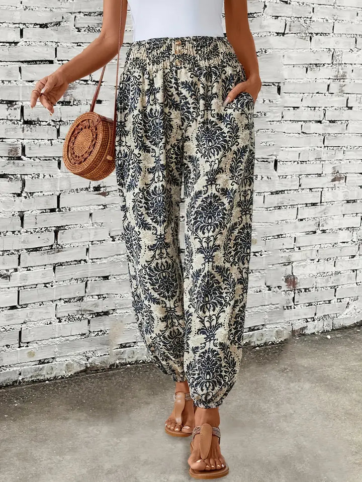 Boho-chic dámské kalhoty s grafickým potiskem – Solara